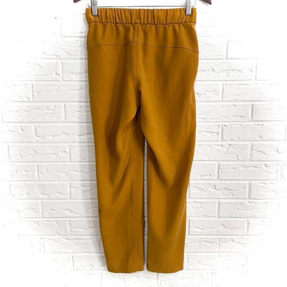 Lululemon On the Fly 7/8 Pant *Woven Fools Gold Size 4 - Picture 3 of 7